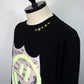 STUD MUFFIN　コットン天竺 ラベルスマイル発泡プリントLS Tシャツ　524-02819-BK