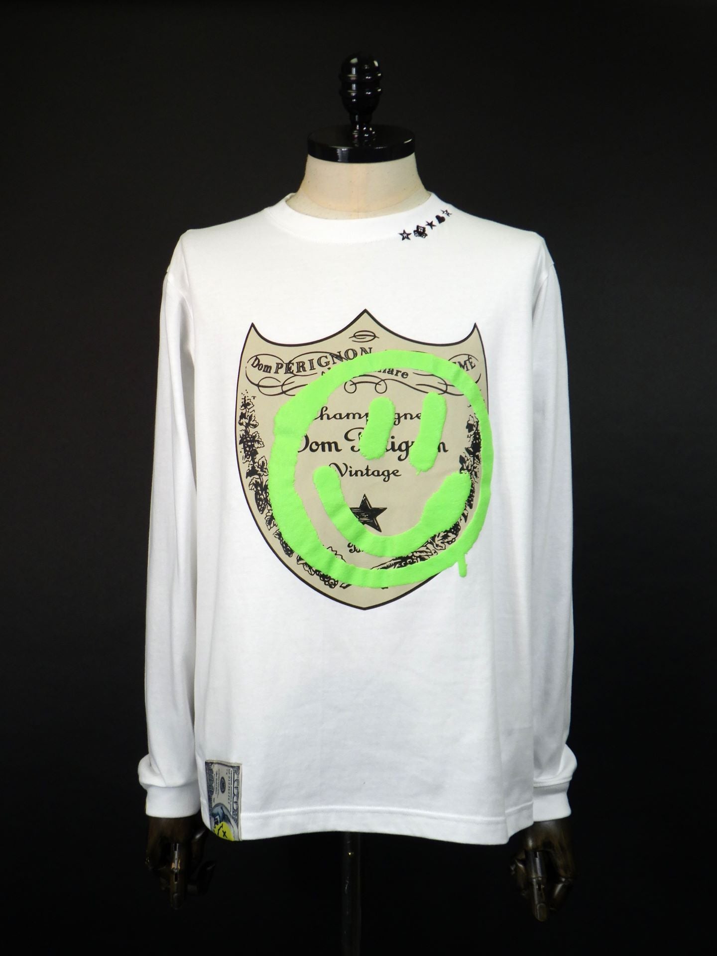 STUD MUFFIN　コットン天竺 ラベルスマイル発泡プリントLS Tシャツ　524-02819-WH